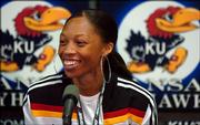Sprinter Allyson Felix smiles as she answers questions Friday afternoon during a press conference at Memorial Stadium.