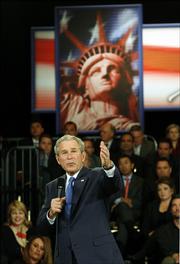 President Bush addresses members of the Orange County Business Council, Monday, April 24, 2006, in Irvine, Calif. As Congress headed back Monday from a two-week recess, President Bush was in the country's most immigrant-rich state to push a stalled bill that would allow more foreigners to work legally in the United States.