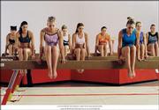 From left front, Nikki Soohoo, Missy Peregrym, Maddy Curley and Vanessa Lengies portray aspiring gymnasts in "Stick It," which opened Friday in Lawrence. "Every gymnast is crazy for doing what they do," says Peregrym, whose character endured full-body ice baths to treat sore muscles.