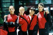 From left, Vanessa Lengies, Maddy Curley, Wei Wei and Missy Peregrym star in the gymnastics movie "Stick It." It reflects the grueling work behind the popular competitive sport.