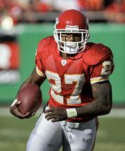 Kansas City Chiefs running back Larry Johnson carries the ball against the Oakland Raiders in his first start of the 2005 season on Nov. 6. Johnson gained 1,627 yards from scrimmage after Nov. 1.