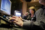Susan Lacy, creator and executive producer of the PBS "American Masters" series, edits an upcoming program with audio engineer David Browning in New York. "American Masters" marks its 20th season this year.
