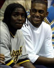 Kansas University recruit Darrell Arthur, right, sits with KU signee Sherron Collins during Late Night in the Phog in October. Arthur is ended his lengthy search and picked KU today.