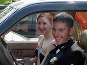 Mallory Richardson, left, and her escort to the 2003 Free State High School prom, Alan Martinez, began dating about a month before the dance. They're now engaged to be
married.