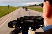 Dave "Slugo" Reed, Lawrence, rides with the local chapter of the Christian Motorcyclists Assn. on his Harley-Davidson motorcycle during a ride last week.