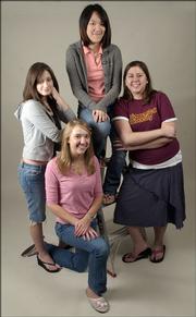 Graduating seniors who were on the Journal-World Teen Board clockwise from bottom center are Laura Parkinson, Lindsey Kennedy, Tiffany Kwak and Sarah Kelly.
