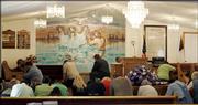 Members of the Cloverfork Missionary Baptist church in Holmes Mill, Ky., gather together in prayer for the five miners killed in an underground explosion Saturday. Though none of the miners were members of the church, the small community is tight-knit and most have connections to the coal industry. The church is less than a mile from the entrance to the mine where the accident occurred.