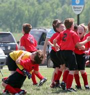 Elite players celebrate their win and undefeated season after defeating the Brazilian Strikers three goals to on in the shoot-out after regulation ended in a one-all tie.