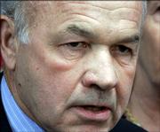 Enron founder Kenneth Lay, left, and former Enron executive Jeff Skilling, below, leave a Houston courthouse after being convicted Thursday of conspiracy to commit securities and wire fraud as part of one of the biggest business scandals in U.S. history.