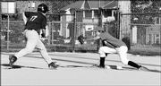 88's player Ryan Leibach tries to make it back to first base, but Bandit Daniel Aul gets ready to put the tag on him. Leibach eventually broke through for a home run in the third inning.