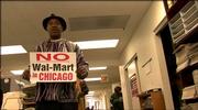 A Chicago resident protests against the retail giant in the documentary "Wal-Mart: The High Cost of Low Price."
