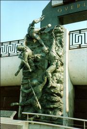 Lawrence artist Jim Brothers' sculpture "Scaling the Wall" at the National D-Day Memorial in Bedford, Va., depicts how the 2nd Army Ranger Battalion scaled Pointe du Hoc's cliffs.