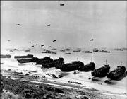 This is the scene along a section of Omaha Beach in June 1944, during Operation Overlord, the code name for the Allied invasion at the Normandy coast in France during World War II.