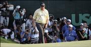 Phil Mickelson reacts after missing a putt on the 18th hole. Mickelson bogied the hole during the final round of the U.S. Open on Sunday in Mamaroneck, N.Y.