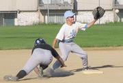 Sidewinder Trenton Sheppard makes the tag on Cub Matt Cole on a pick-off attempt in the fourth inning. Cole was safe on the play and scored later in the inning to put the Cubs ahead 2-1, but the Sidewinders eventually came out on top 3-2.