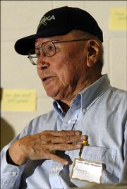 Oscar Kawagley, of Fairbanks, Alaska, discusses global warming Monday at Haskell Indian Nations University. Kawagley, an Alaskan native, warned about the impact of climate change on indigenous cultures.