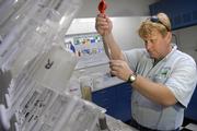 Kelly French, Wastewater Treatment Plant operator, does a process test to determine total solids content from samples taken from a plant's basins. The test is done once a day.