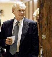 Former Oklahoma district judge Donald Thompson walks into the courtroom Thursday at the courthouse in Bristow, Okla. A jury found Thompson, 59, guilty of four counts of indecent exposure.