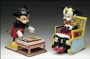 Young Mickey and Minnie became popular tin toys. Here Minnie is knitting as she sits on a rocking chair. Mickey is playing the xylophone. The 7-inch toys sold as a pair for $230 at an auction in Maine.