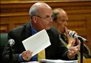 Rep. Jim Ward, D-Wichita, a member of the special House committee assigned to investigate Kansas Supreme Court Justice Lawton Nuss, talks about what the committee has learned up to this point and what steps they should take Thursday at the Statehouse in Topeka. Rep. Mike Peterson, D-Kansas City, listens in the background.