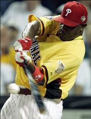 The Phillies' Ryan Howard connects during the Home Run Derby. Howard won the event Monday in Pittsburgh.
