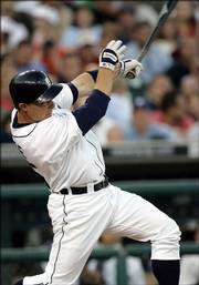 Detroit Tigers' Brandon Inge hits an RBI single during Detroit's five-run fifth inning. The Tigers erased the Royals' early lead and came out on top, 6-4, Thursday in Detroit.