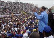 Congo presidential candidate Oscar Kashala speaks at a campaign rally in Kinshasa, Congo. The Congolese-born doctor has returned to his home country after nearly two decades in Boston to vie for the presidency against more than 30 other candidates in the July 30 elections.