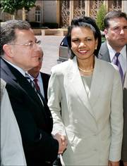 Lebanon's Prime Minister Fuad Saniora greets U.S. Secretary of State Condoleezza Rice as she arrives Monday in Beirut, Lebanon.