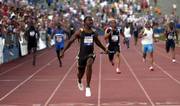 Justin Gatlin crosses the finish line as the anchor of the 4x100 relay in the Kansas Relays. After the event April 22, Gatlin tested positive for testosterone or one of its precursors, he said Saturday.