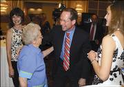 Jim Barnett gives his mother, Jean, a hug while celebrating his primary victory in Overland Park. Barnett won the GOP gubernatorial primary and will face Gov. Kathleen Sebelius in November.