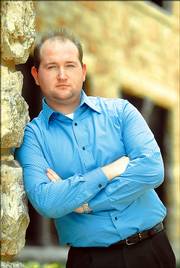 Jonathan Kealing is the editor of the fall University Daily Kansan. He became interested in journalism through an elective class offered at his high school.