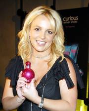 This file photo, originally supplied by Elizabeth Arden, shows Britney Spears promoting her new perfume, In Control, in New York. Since the launch of Curious in September 2004, 10 million bottles of Spears' fragrances have been sold. Her other fragrance is Fantasy.