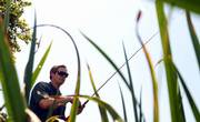 Craig Busboom, Eudora, fishes at Potter Lake on the campus of Kansas University. Busboom, business operations supervisor for the university's athletic department, enjoys fishing the lake for bass.