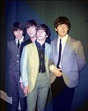 British rock 'n' roll group The Beatles, from left to right, George Harrison, John Lennon, Ringo Starr and Paul McCartney, are seen during their first U.S. tour in 1964. The Beatles and other artists refuse to allow their music to be sold on iTunes for downloading, claiming that they are getting only a small slice of digital profits.