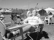 Karin Feltman, emergency room nurse at Lawrence Memorial Hospital, takes a break from working on a home in Long Beach, Miss. Feltman made her second trip to Mississippi this spring, and lived for a week in a tent at the site.