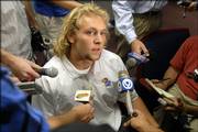 Kansas University quarterback Kerry Meier is slated to start the Jayhawks' season opener against Northwestern State at 6 p.m. Saturday. His brother, Dylan, will start under center for Kansas State at the same time against Illinois State. Kerry Meier answered questions at Tuesday's KU football news conference.