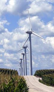 A wind-collecting unit, above, stands more than 60 feet tall outside Blairsburg, Iowa, where one of the largest wind power experiments in the U.S. dots the landscape.