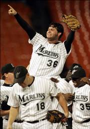 Florida pitcher Anibal Sanchez is hoisted atop his teammates' shoulders as they celebrate his no-hitter. Sanchez tossed the gem in a 2-0 victory over the Diamondbacks on Wednesday in Miami.