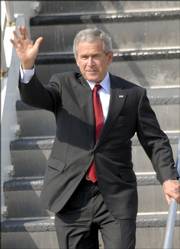 President Bush made a quick visit Friday to Kansas City, Mo., appearing at a fundraiser for Sen. Jim Talent, a Missouri Republican seeking re-election. Some political observers say candidates may shy away from the president because of his lower job approval ratings.