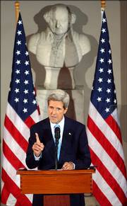 Sen. John Kerry, D-Mass., speaks Saturday at Boston's Faneuil Hall about issues relating to the war on terrorism and called on Democrats to rally around his plan to pull U.S. combat troops out by next July and redeploy some to Afghanistan.