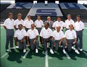 Former Kansas State coach Bill Snyder turned around a dismal Wildcat football program in the 1990s with the help of solid up-and-coming assistants now making a name for themselves in the college game. This photo, taken sometime in the early 1990s, shows (front row, from left): John Latina, Nick Quartaro, Kevin Ramsey, Del Miller, Bruce Van De Velde. (back row, from left): Dana Dimel, Jim Leavitt, Jerry Palmieri, Bob Stoops, Bill Snyder, Mark Mangino, Mike Stoops and Bob Cope.
