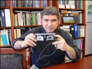 Nasser Peyghambarian, a University of Arizona professor of optical sciences, materials science and engineering, is leading research into a new type of eyeglasses, below, that would replace bifocals and progressive lenses. The new glasses use liquid crystal to allow for automatic focus, much like an auto-focus camera.