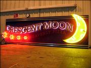 Star Signs & Graphics, Lawrence, produced signage for the Superdome's concession stands, such as Crescent Moon.