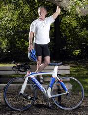Lawrence optometrist Kent Dobbins recently won the United States Amateur Triathlon half-ironman national championship for the 60-64 age group. Dobbins, 61, participates in four to six triathlons a year.