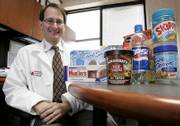 Dr. Russell Rothman, of Vanderbilt University Medical Center in Nashville, Tenn., displays some of the products he used in his study of nutrition labels and how well people understand them. According to Rothman's findings, people often don't factor in serving size or miscalculate how much they're eating.