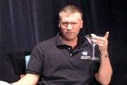 Rich Mitchell, superintendent of the Bremen High School District 228 in Midlothian, Ill., holds a martini glass in a mock documentary he created and posted on the district's Web site in this image taken from video provided by WBBM-TV in Chicago. The district's school board will conduct an investigation into Mitchell's video, which could lead to his firing.