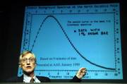 John C. Mather, an astrophysicist at NASA's Goddard Space Flight Center, shows some of the earliest data from the Cosmic Background Explorer satellite during a news conference Tuesday at NASA headquarters in Washington, D.C. Mather and George F. Smoot on Tuesday were awarded the 2006 Nobel Prize in physics.