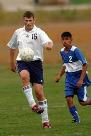 Seabury Academy's Simon Thompson (16) controls the ball as Kansas City Sumner's Alfredo Ceron comes up to challenge the play. Thompson had an assist Monday in the Seahawks' 2-0 victory at the Youth Sports Inc., fields.
