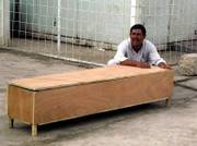 An Iraqi man cries over a coffin of a relative in Baqouba, Iraq, 35 miles northeast of Baghdad. Three people were killed Wednesday in Baqouba when assailants sprayed gunfire into their van, police said. Violence in Iraq claimed at least 14 lives Wednesday.