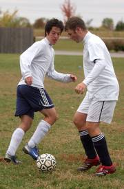 Seabury Academy Otavio Gallo, left, and Simon Thompson work on a play during practice. Gallo (Brazil), Thompson (Great Britain) and Aaron Chung (Korea) give the Seahawks a foreign flavor on the soccer pitch, as does head coach Gunar Harmon, who was raised in Germany.